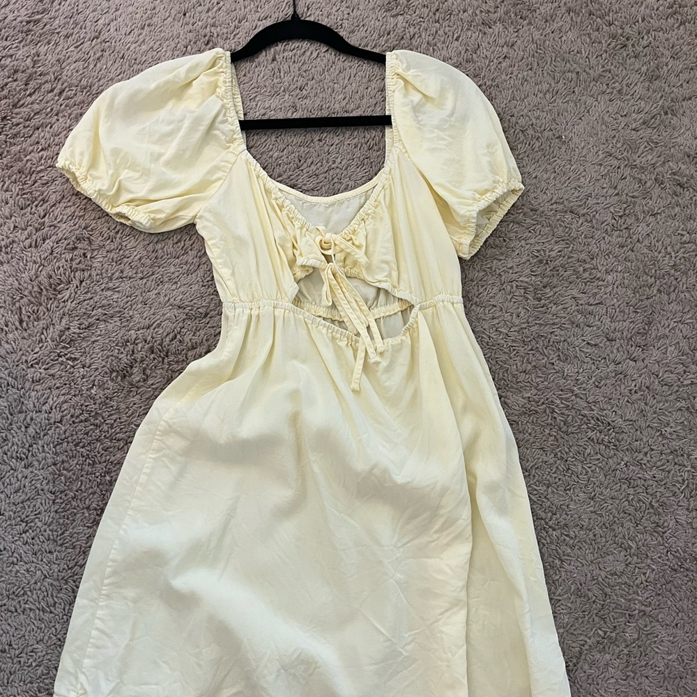 yellow mini dress with opening in front